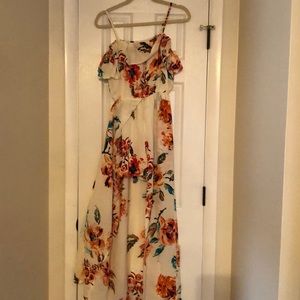 Romper with long skirt overlay.